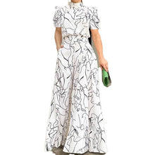 Load image into Gallery viewer, Black and Abstract Printed Jumpsuit