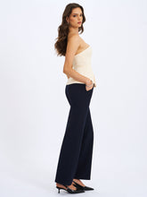 Load image into Gallery viewer, Yani Ivory Asymmetrical Lapel Sleeveless Peplum Top