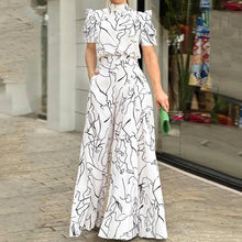 Load image into Gallery viewer, Black and Abstract Printed Jumpsuit