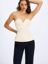 Load image into Gallery viewer, Yani Ivory Asymmetrical Lapel Sleeveless Peplum Top