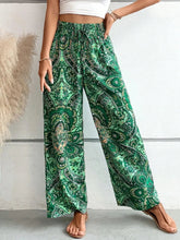 Load image into Gallery viewer, Women's Paisley Print Wide-Leg Pants – Boho Smocked Elastic Waist Tie-Up Flowy Trousers