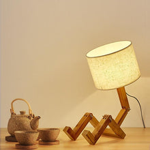 Load image into Gallery viewer, New Modern Luxury and Retro STEVVEX Wood Robot Shape Folding Table Lamp Creative European Fashion Bedroom Study Bedroom Bedside Linen Lamp Shade Table Lamp