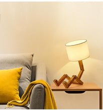 Load image into Gallery viewer, New Modern Luxury and Retro STEVVEX Wood Robot Shape Folding Table Lamp Creative European Fashion Bedroom Study Bedroom Bedside Linen Lamp Shade Table Lamp