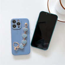 Load image into Gallery viewer, Soft Silicone Love Heart Chain Luxury Soft Flexible with Love Heart Chain Bracelet Hand Strap Girly Women Protective Cover for iPhone Wrist Bracelet Phone Case For iPhone 12 13 14 Pro Max Mini 11 Pro Max X XS Max XR 7 8 Plus