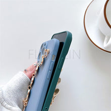 Load image into Gallery viewer, Soft Silicone Love Heart Chain Luxury Soft Flexible with Love Heart Chain Bracelet Hand Strap Girly Women Protective Cover for iPhone Wrist Bracelet Phone Case For iPhone 12 13 14 Pro Max Mini 11 Pro Max X XS Max XR 7 8 Plus