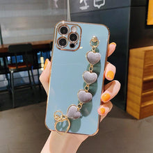 Load image into Gallery viewer, Luxury Women Silicone Phone Case Cover With Wrist Chain Bracelet for iPhone Wristband Bracelet Hand Holder Cover for iPhone 13 12 11 Pro Max plating Case Heart Chain Cases for iPhone 7 8 Plus XR XS Max X