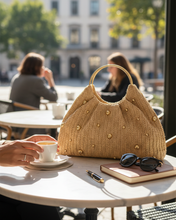 Load image into Gallery viewer, Artisanal Studded Handwoven Raffia Bag with Sculptural Gold Ring Handle