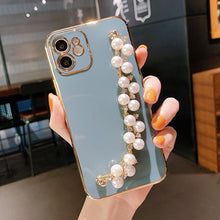 Load image into Gallery viewer, Beautiful White Pearl Chain Gold Color Plating Straight Edge Phone Case for iPhone 13 11 12 Pro Max Case for iPhone X XS MAX XR 7 8 Plus Phone Case Plating Pearl Chain Wrist Bracelet Cover