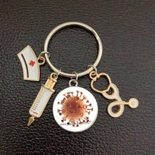 Load image into Gallery viewer, Creative Doctor Keychain Unique Personality Syringe Stethoscope Pendant Keychain Cartoon Colorful Handbag Pendant Keychain Doctor Injection Stethoscope Picture Keychain Round Dome Pendant Women Alloy Keychain