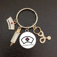 Load image into Gallery viewer, Creative Doctor Keychain Unique Personality Syringe Stethoscope Pendant Keychain Cartoon Colorful Handbag Pendant Keychain Doctor Injection Stethoscope Picture Keychain Round Dome Pendant Women Alloy Keychain