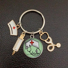 Load image into Gallery viewer, Creative Doctor Keychain Unique Personality Syringe Stethoscope Pendant Keychain Cartoon Colorful Handbag Pendant Keychain Doctor Injection Stethoscope Picture Keychain Round Dome Pendant Women Alloy Keychain