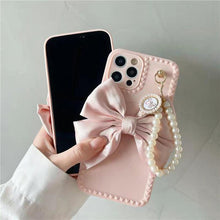 Load image into Gallery viewer, Cute Luxury Fashion 3d Bow Pearl Bracelet Girl Soft Case For iPhone 11 12 13 Pro Max 7 8 Plus Xr X Xs Se Anti-drop Cover Pearl Chain Bow Phone Case Ideal for iPhone Elegant Phone Case