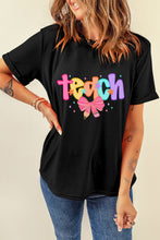Load image into Gallery viewer, Black Teach Bow Graphic Holiday Tee
