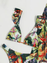 Load image into Gallery viewer, Bloom Breeze 3-Piece Bikini Set – Elegant High Cut Floral Fluttering Swimsuit with Lettuce Trim Tie Back Bandeau and Coordinating Cover Up Skirt – Women&#39;s Romantic Swimwear for Beach &amp; Resort Vacations
