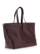 Load image into Gallery viewer, Tod&#39;s Women Bordeaux Tote Bag With Two Top Handles And Embossed Logo Lettering On The Front In Leather Woman
