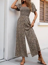 Load image into Gallery viewer, Floral smocked jumpsuit
