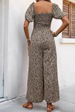 Load image into Gallery viewer, Floral smocked jumpsuit

