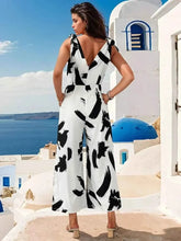 Load image into Gallery viewer, Perfee Tied Printed Surplice : Sleeveless Jumpsuit
