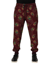 Load image into Gallery viewer, Dolce &amp; Gabbana Burgundy Peacock Feather Print Jogger Pants
