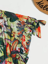 Load image into Gallery viewer, Bloom Breeze 3-Piece Bikini Set – Elegant High Cut Floral Fluttering Swimsuit with Lettuce Trim Tie Back Bandeau and Coordinating Cover Up Skirt – Women&#39;s Romantic Swimwear for Beach &amp; Resort Vacations
