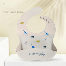 Load image into Gallery viewer, Cute Cartoon Print Baby Bibs Waterproof Soft Silicone Baby Feeding Stuff Dinosaur Pattern Bib For Kids
