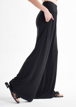 Load image into Gallery viewer, Black Knit 2-Piece Set With An Asymmetrical One-Sleeve Blouse And Palazzo Pants
