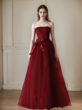 Load image into Gallery viewer, Elegant Strapless Burgundy Tulle Ball Gown with Corset Back and Ribbon Tie
