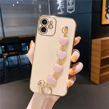 Load image into Gallery viewer, Luxury Women Silicone Phone Case Cover With Wrist Chain Bracelet for iPhone  Wristband Bracelet Hand Holder Cover for iPhone 13 12 11 Pro Max plating Case Heart Chain Cases for iPhone 7 8 Plus XR XS Max X

