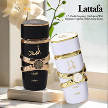Load image into Gallery viewer, Lattafa Yara Candy EDP 100ML - Irresistible Pheromone-Infused Fragrance for Unforgettable Attraction
