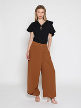 Load image into Gallery viewer, Ruffled neck &amp; sleeve brooch detail solid top
