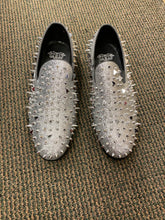 Red and top silver shoes